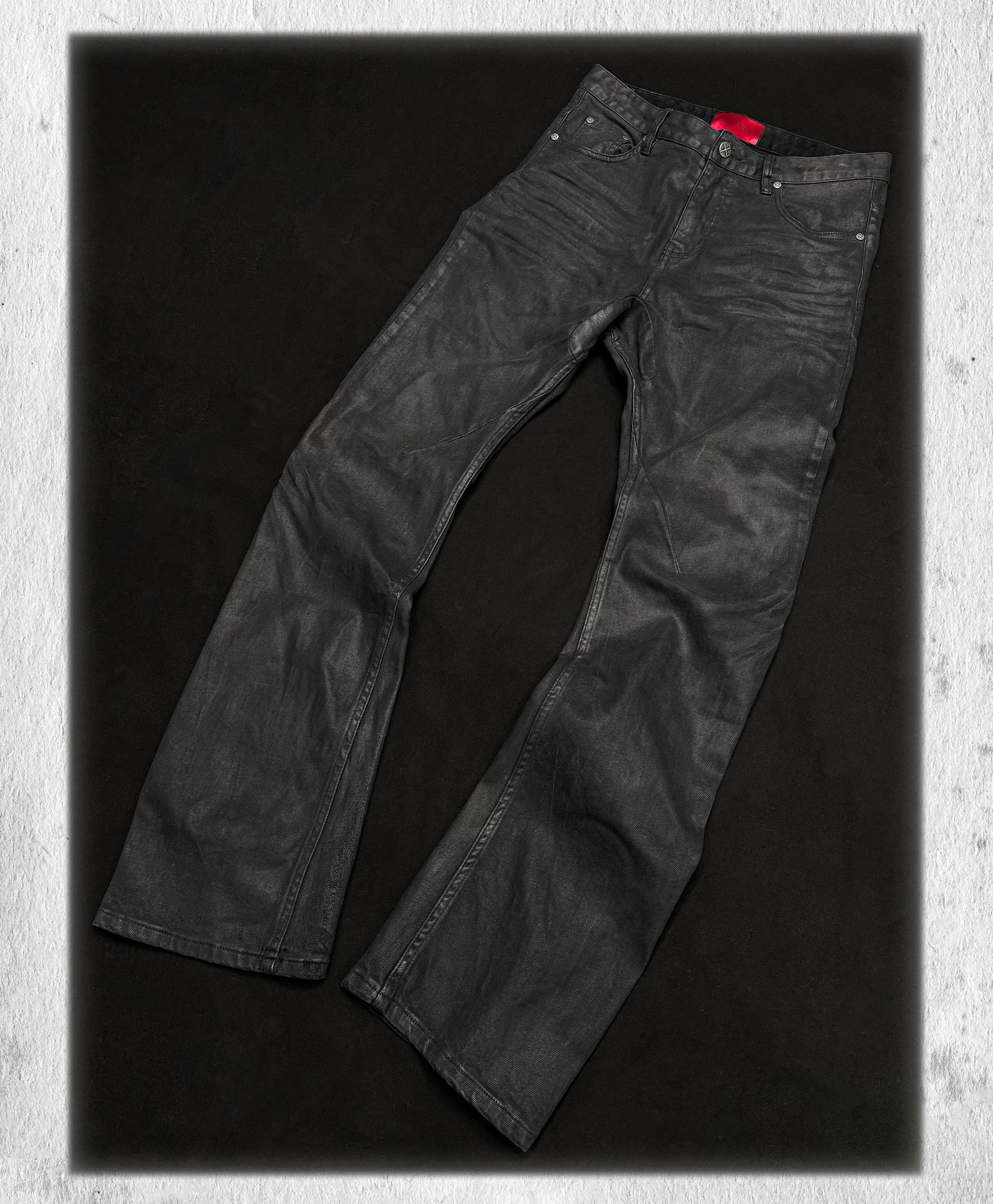 Stacked Curved Coated Waxed Skinny Jeans