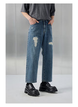 Distressed Patched Denim Pants