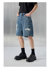 Distressed Patched Denim Pants