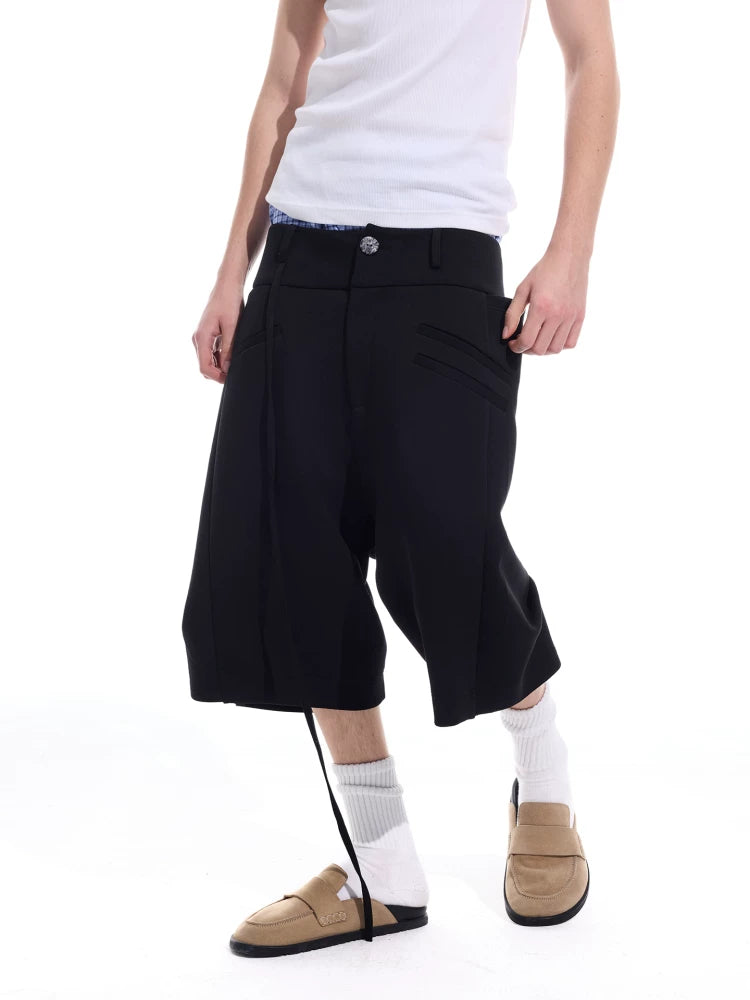 Cropped Pocketed Sashed Curved Hem Shorts