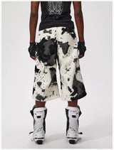 Cropped Cow Print Faux Fur Shorts