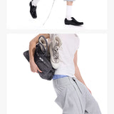 Cropped Pocketed Sashed Curved Hem Shorts
