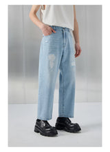 Distressed Patched Denim Pants