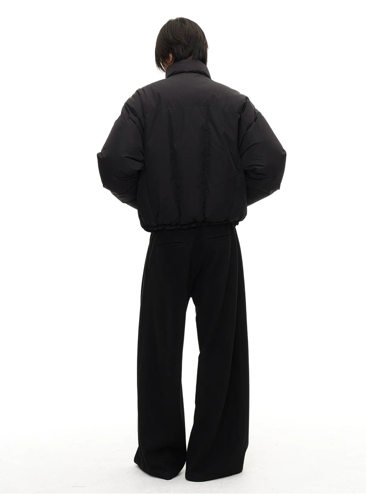 Slightly Curved Asymmetric Pleated Wool Pants