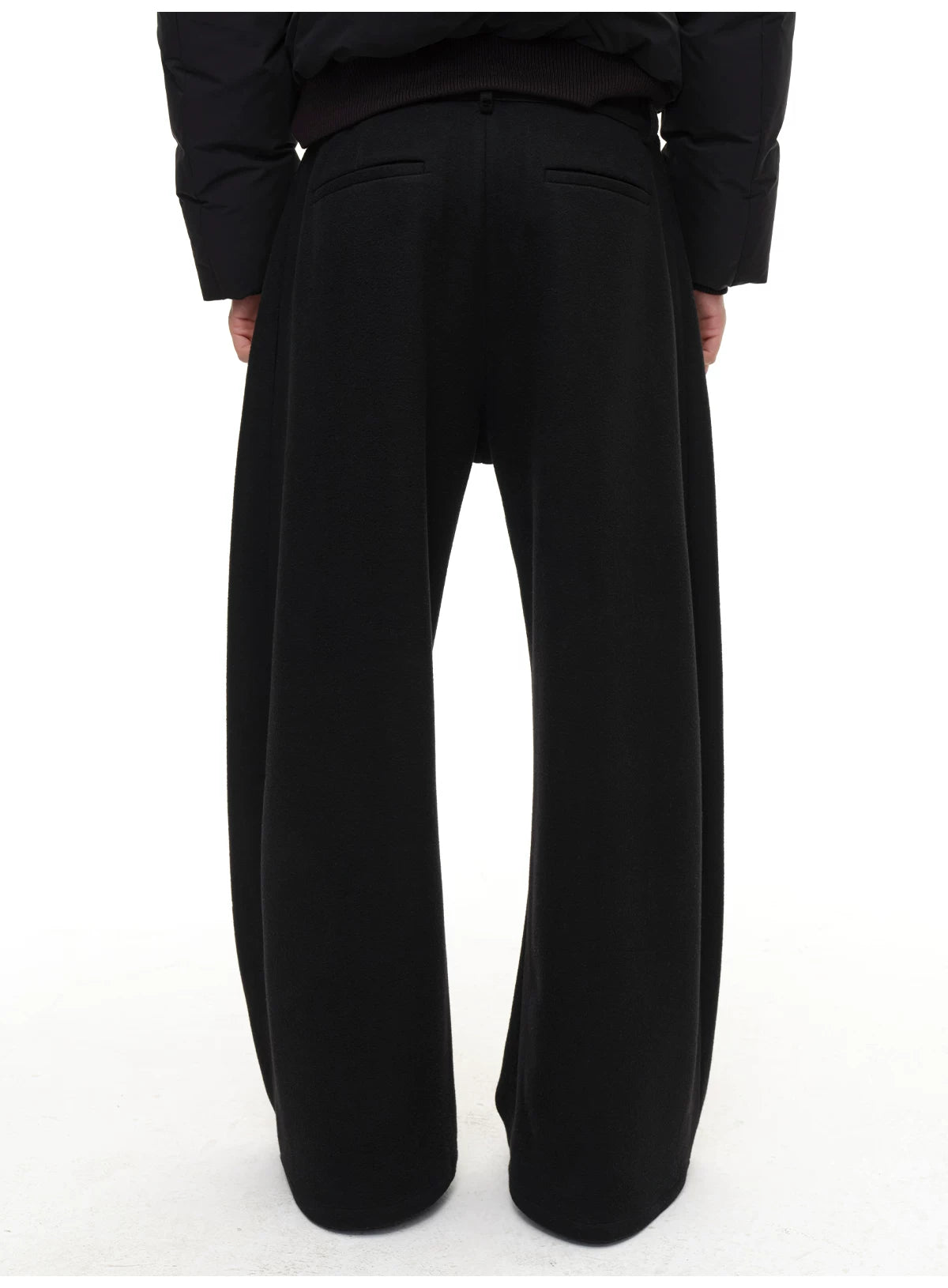Slightly Curved Asymmetric Pleated Wool Pants