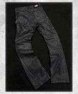 Stacked Curved Coated Waxed Skinny Jeans
