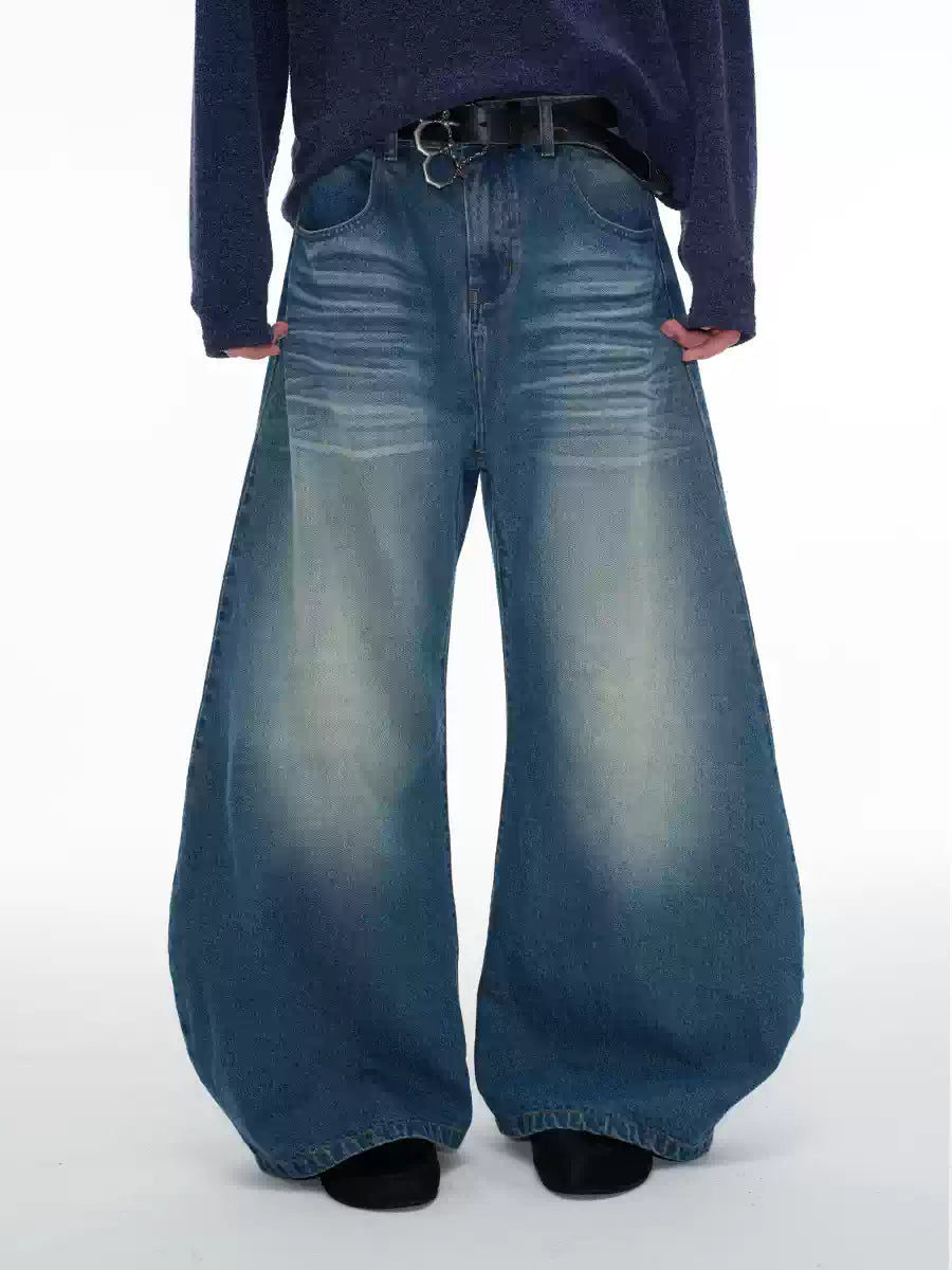 Pleated Distressed Wide Curved Jeans
