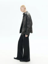 Asymmetrical Flare Waxed Jeans