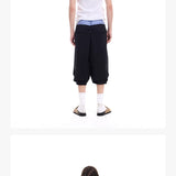 Cropped Pocketed Sashed Curved Hem Shorts