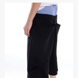 Cropped Pocketed Sashed Curved Hem Shorts