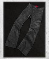 Stacked Curved Coated Waxed Skinny Jeans