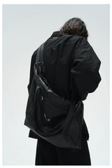 Leather Crossbody Bag with Metal Plaque