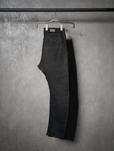 Waxed Distressed Curved Slim Jeans
