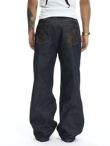 High-Density Embroidery Flared Raw Denim Jeans