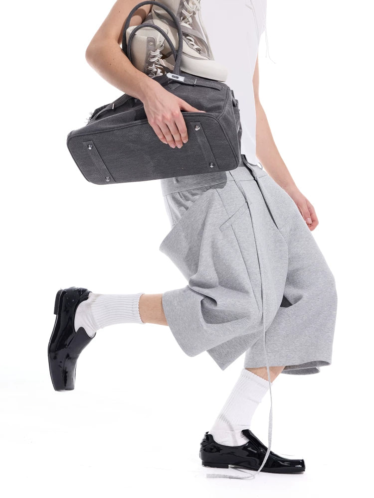 Cropped Pocketed Sashed Curved Hem Shorts