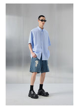 Distressed Patched Denim Pants