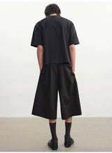 Houndstooth Pleated Capri Pants